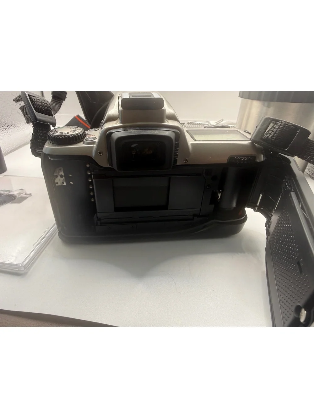 Nikon N65 35-70mm SLR Film Camera with Accessories and Carrying Case